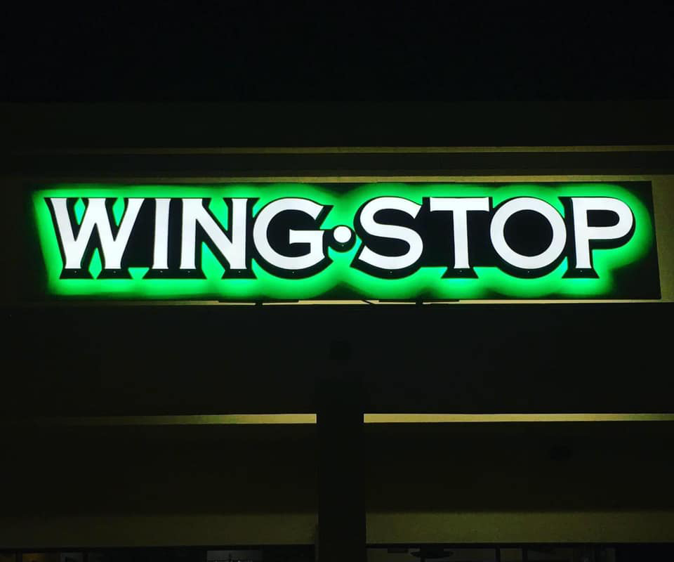 Face-lit and backlit channel letters on an aluminum backer for Wingstop in Texarkana, TX
